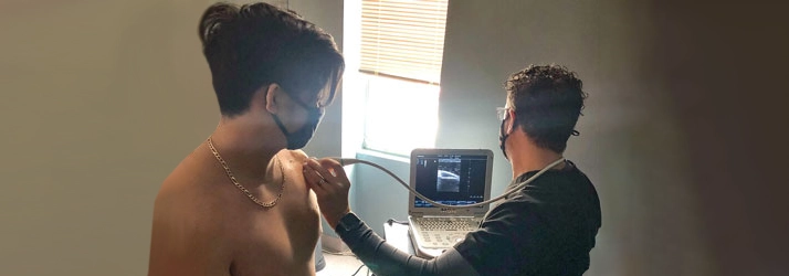 Chiropractic Bowie MD Patient Receiving Muscuoloskeletal Ultrasound Chiropractic Bowie MD Patient Receiving Muscuoloskeletal Ultrasound